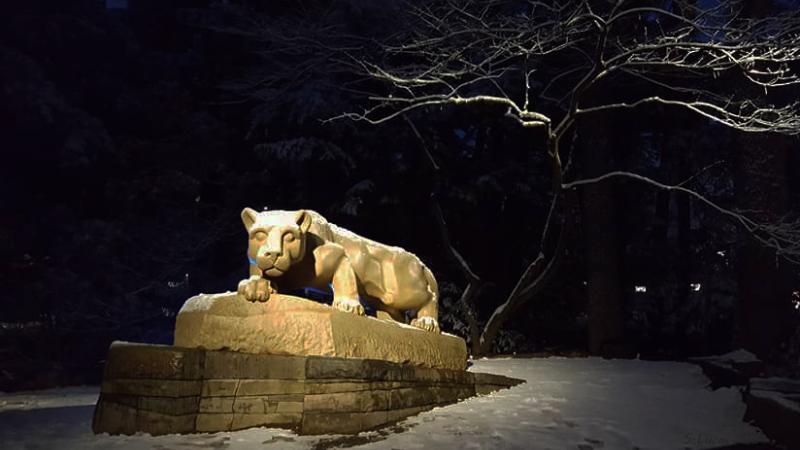 Evening image of the Lion Shrine in winter at Penn State